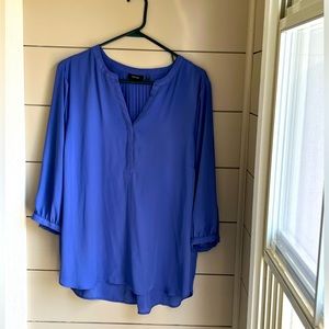 Pretty purplish blue blouse with accent pleats in back. 1X